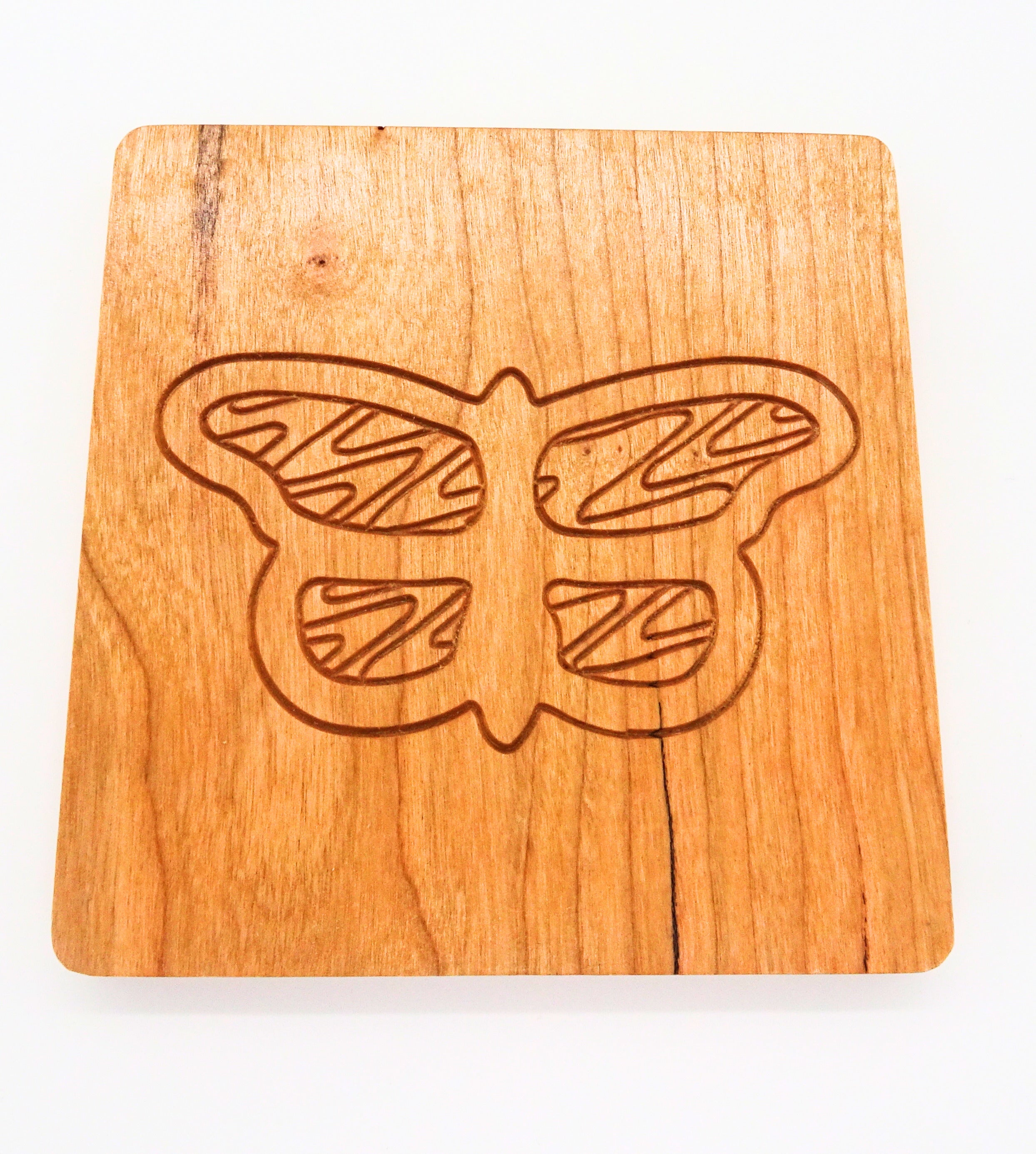 square wooden coaster with a butterfly design 