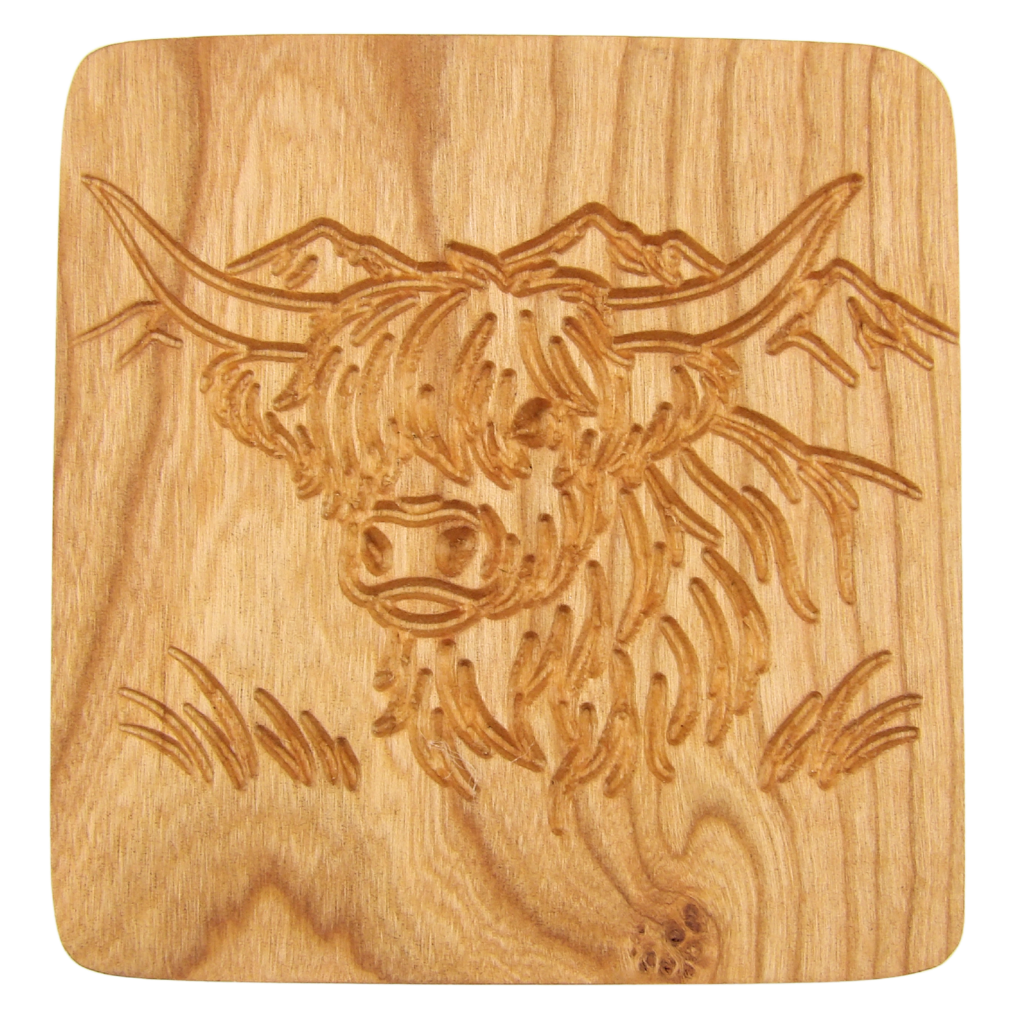 A square wooden coaster with rounded corners, featuring a hand-carved Highland cow design on a light natural wood grain background.