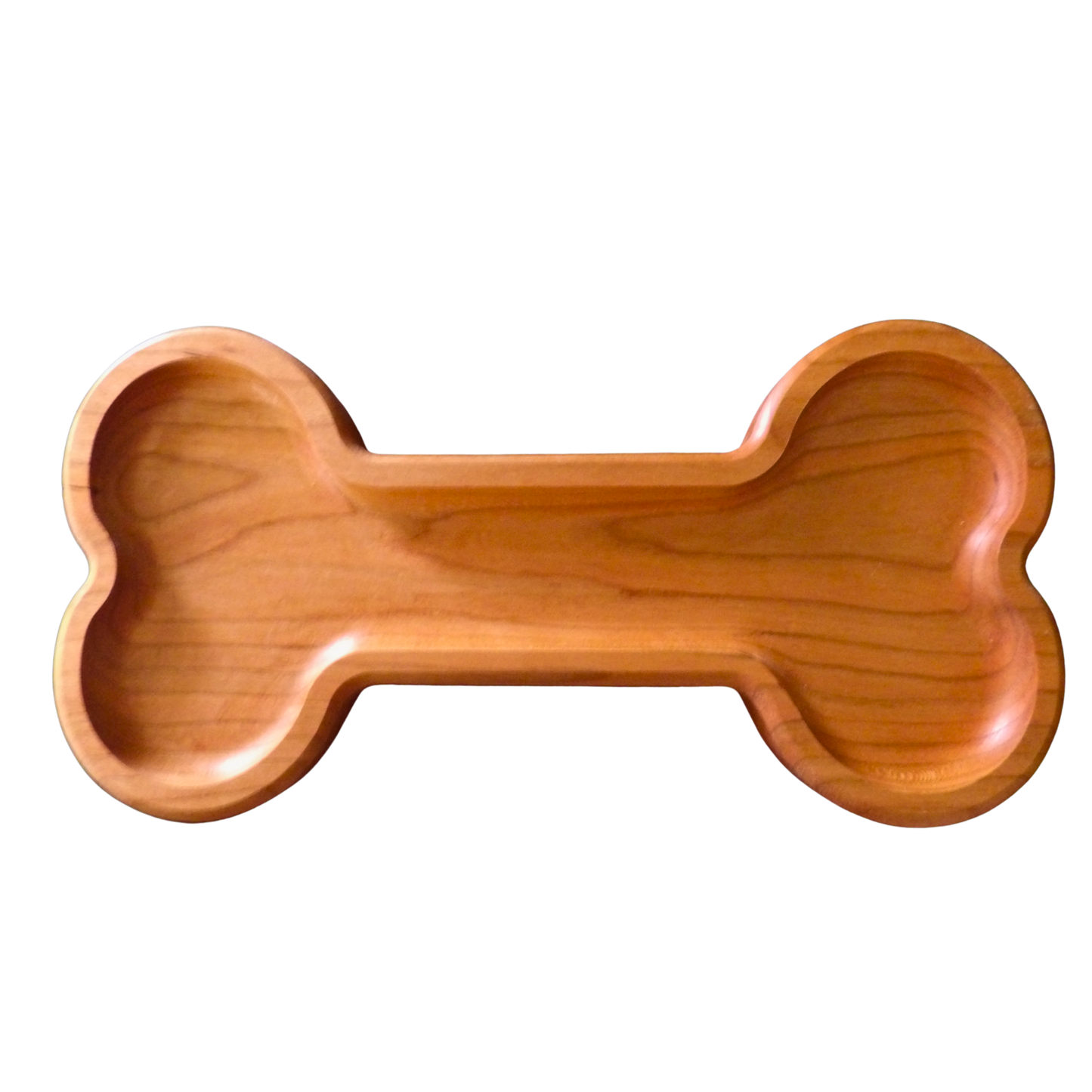 A bone-shaped wooden tray with a smooth, polished finish and visible wood grain, shown on a checkered transparency background.