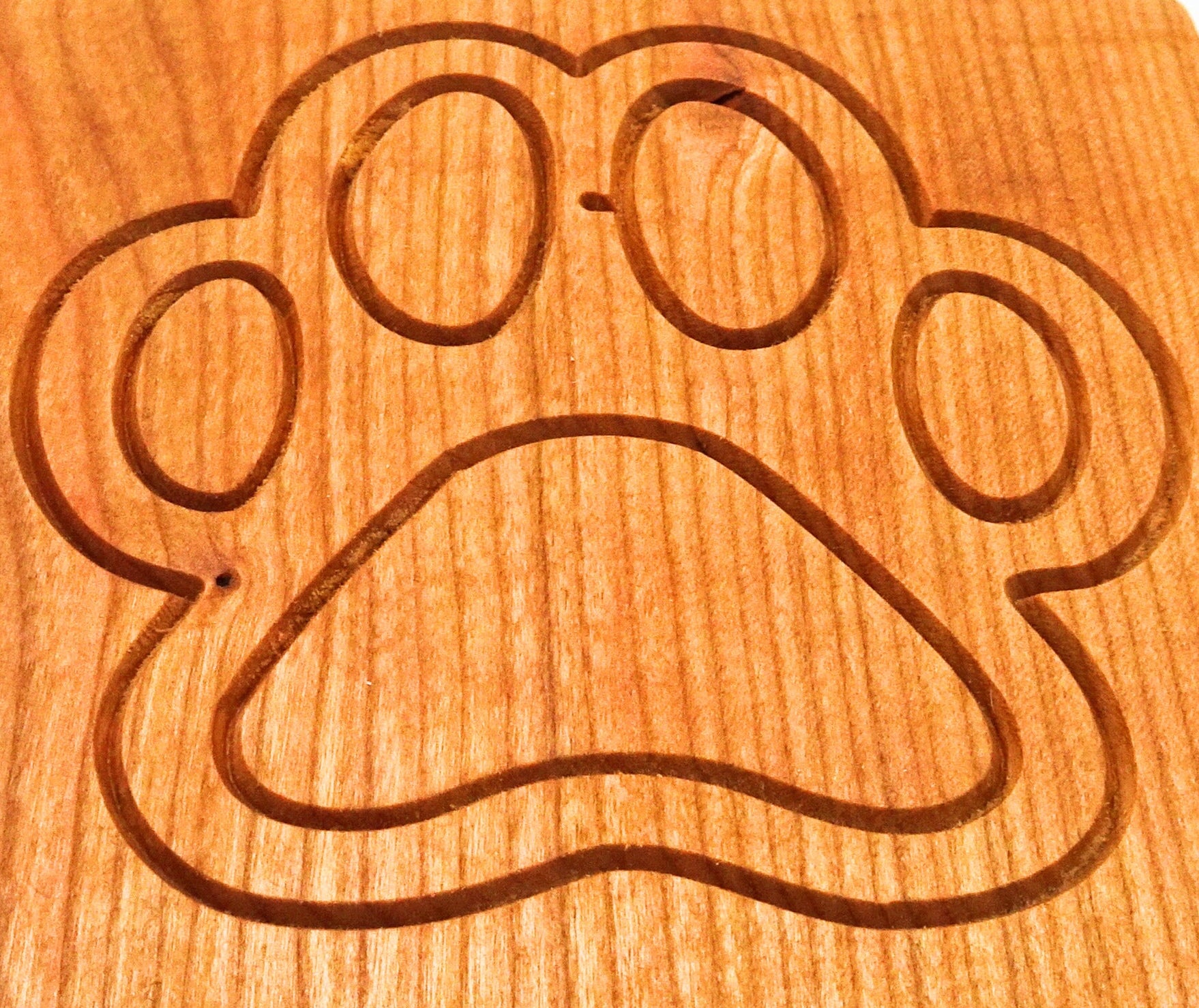 square cherry Wooden coaster with a dog paw engraved