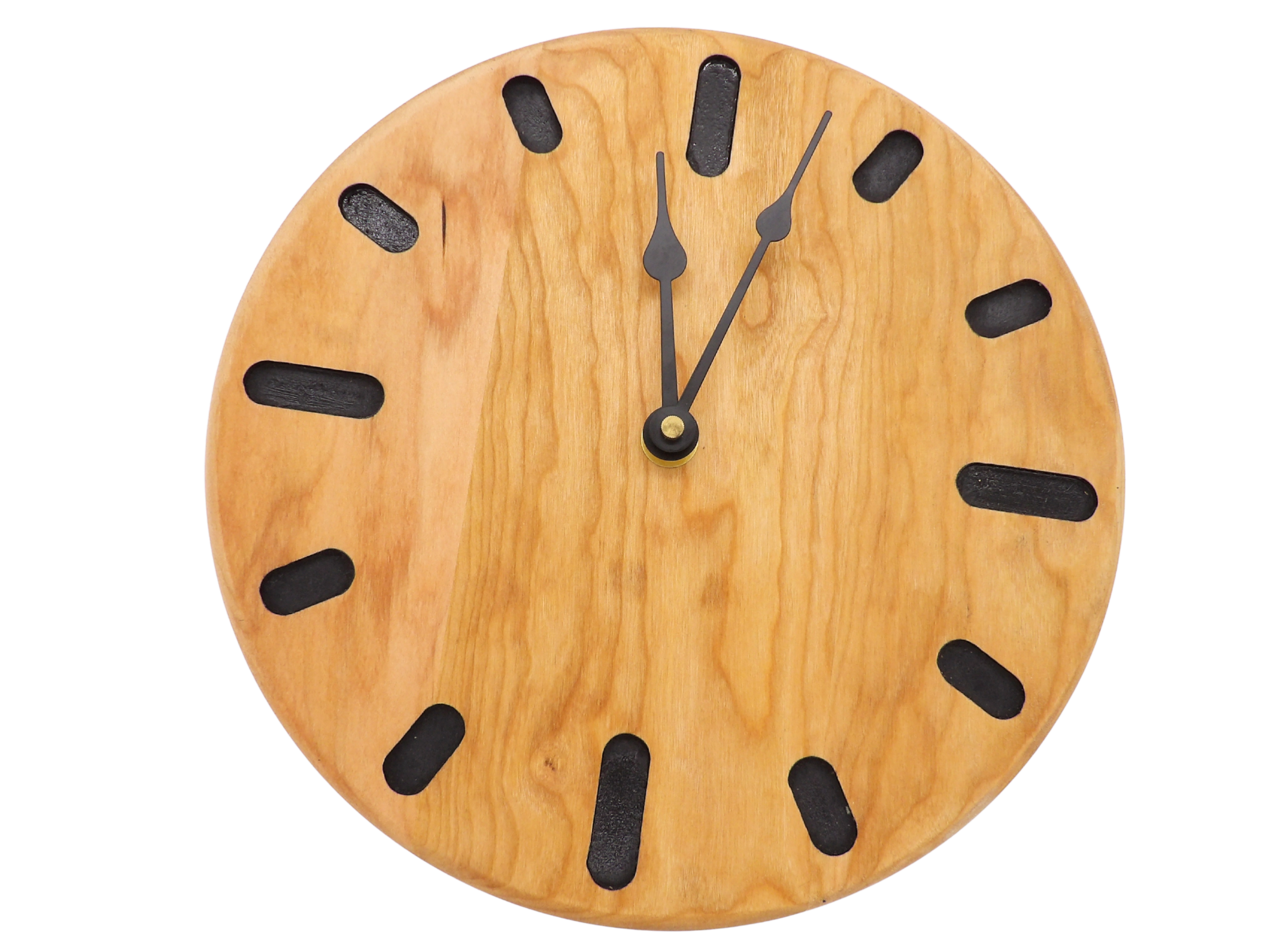 round cherry wooden wall clock with black oval hour markers and black spade hands