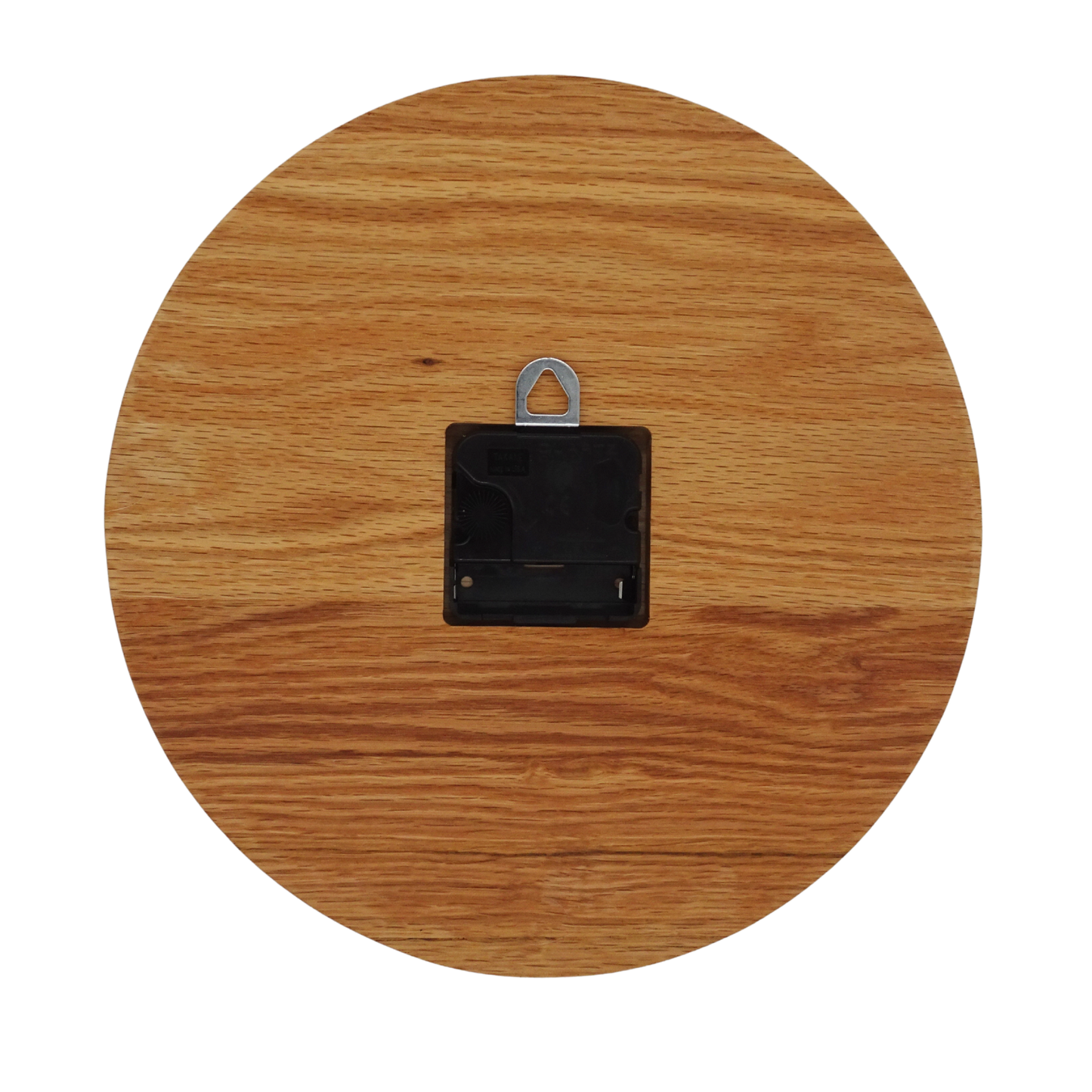 round oak wooden wall clock with black spade hands and carved numbers