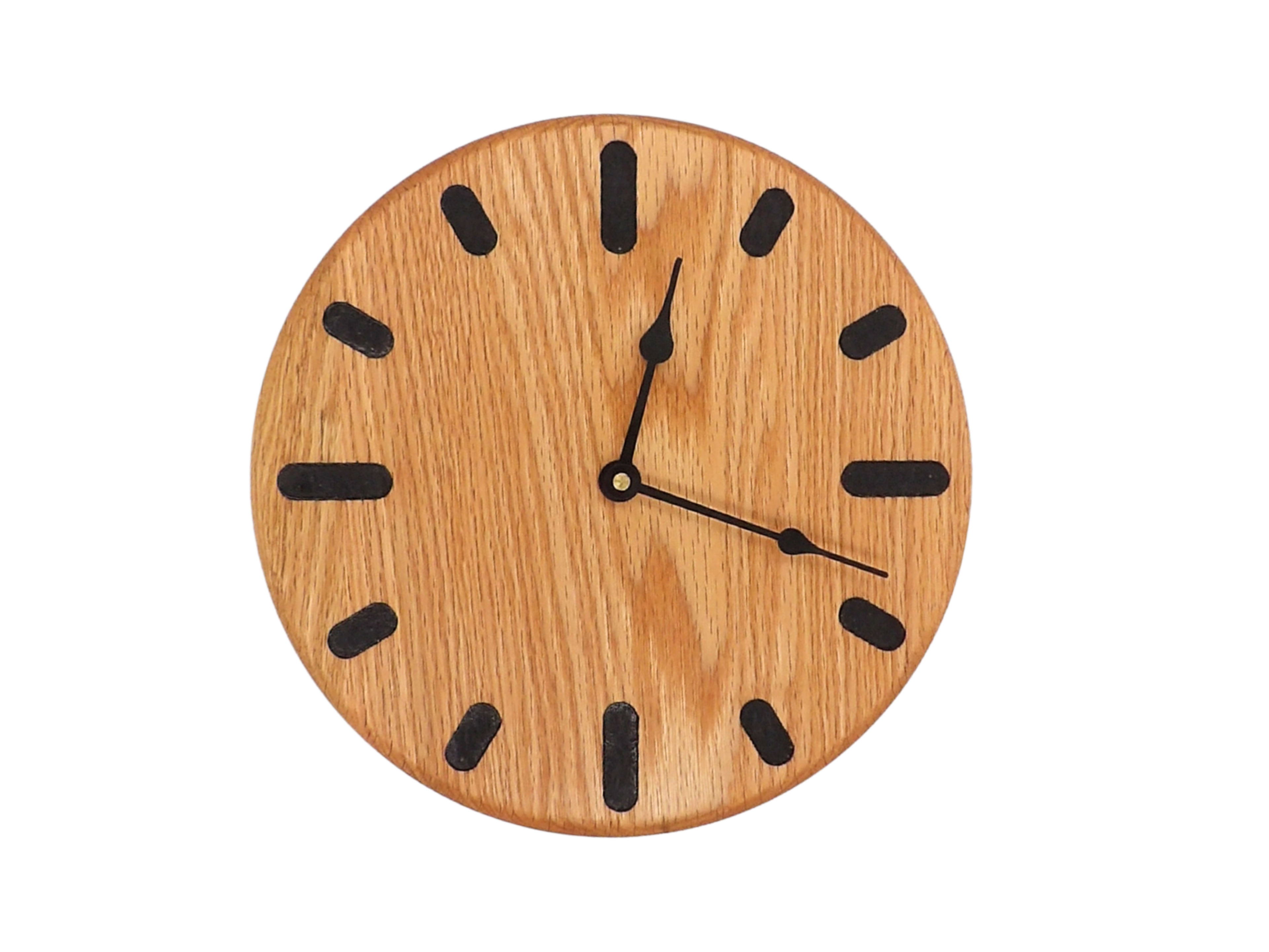 Wooden wall clock with black hour markers on a white background