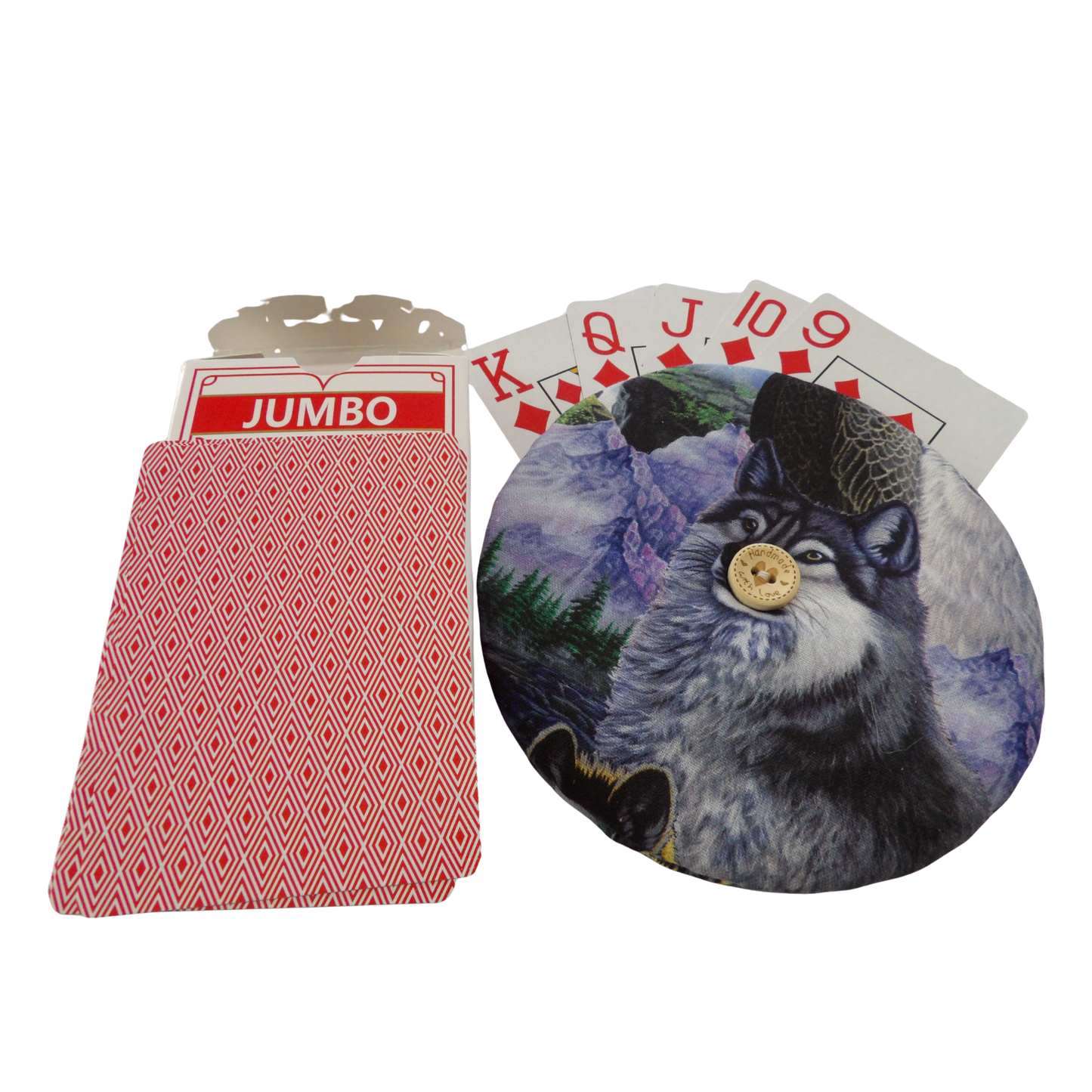 Playing cards with 'Jumbo' text and a wolf illustration on a round card holder